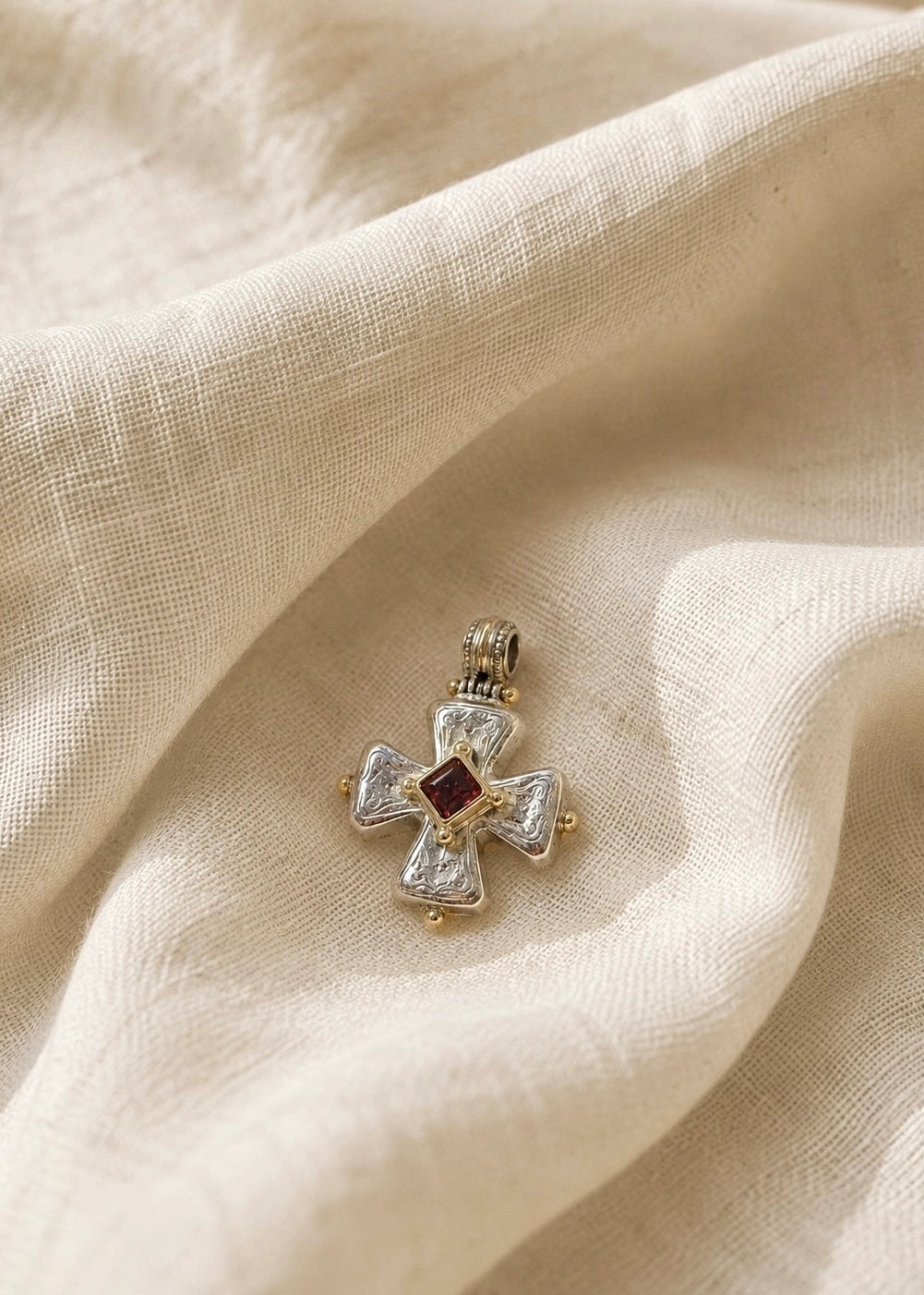 Silver Cross with Gold Details and Garnet