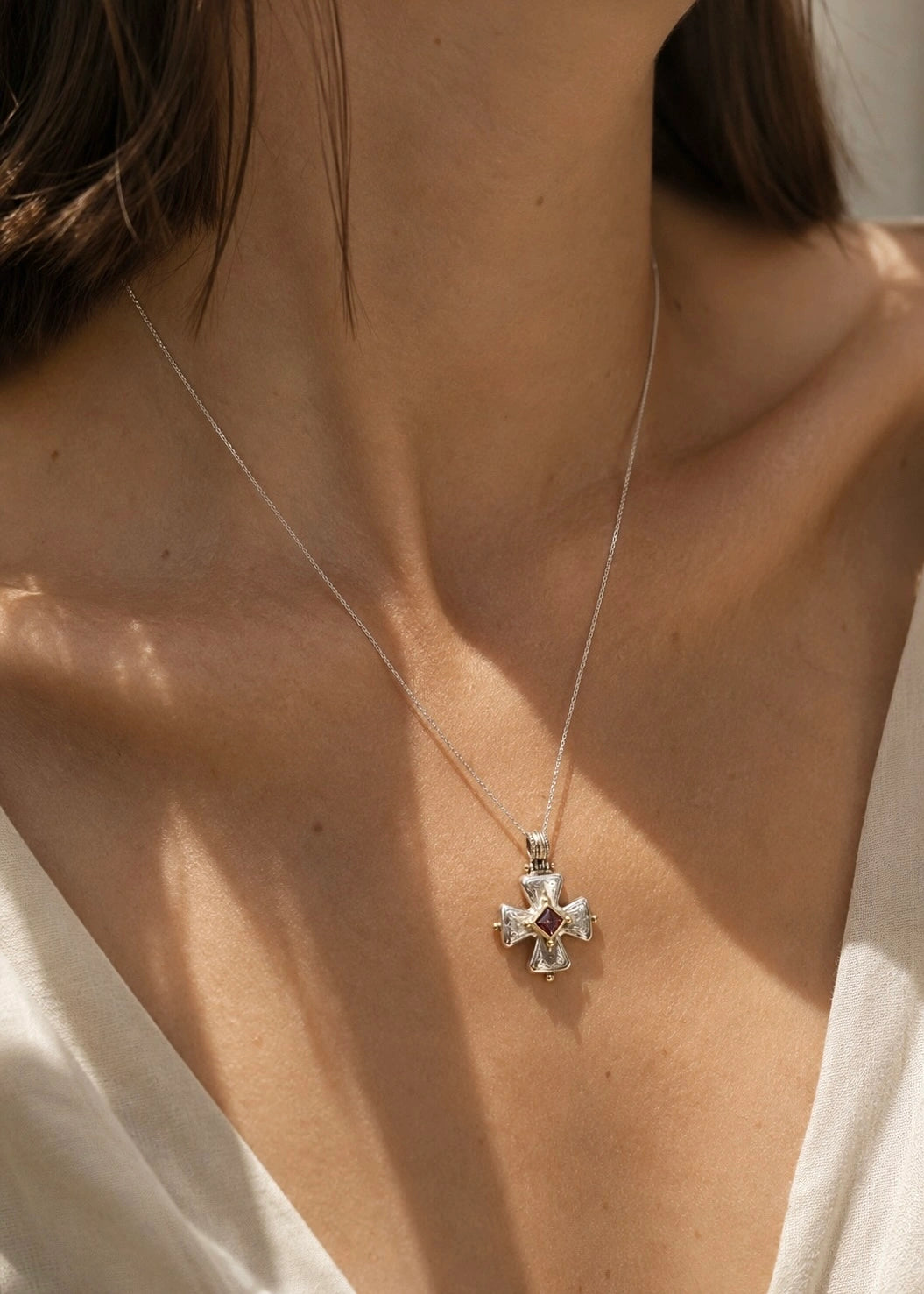 Silver Cross with Gold Details and Garnet
