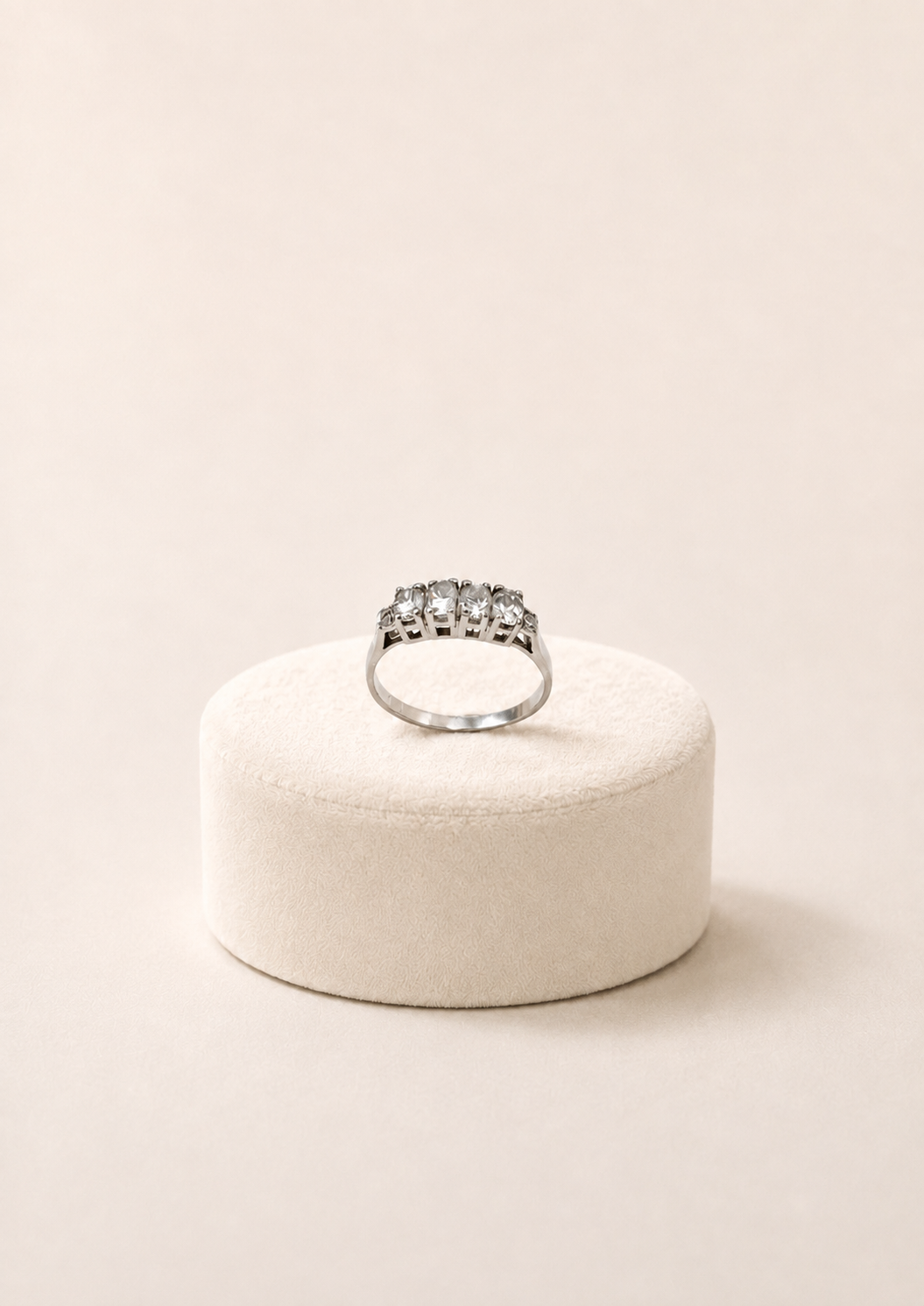 Sterling silver band ring with six white zircons, close-up